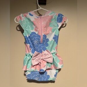 Ruffle Butts pastel petals peplum swimsuit 12-18 months